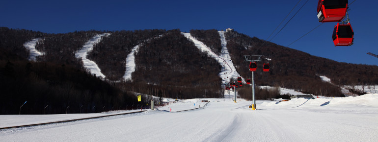 Modern gondolas at Sun Mountain Yabuli resort.